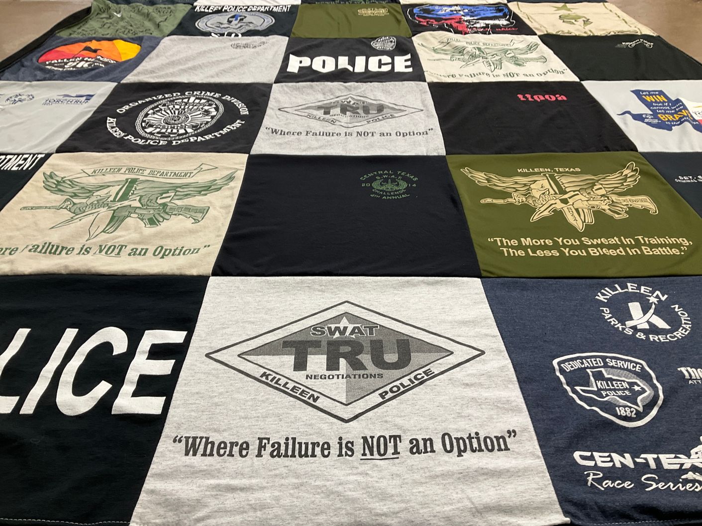 T-shirt quilt with law enforcement, public safety themes by Wendy from TX