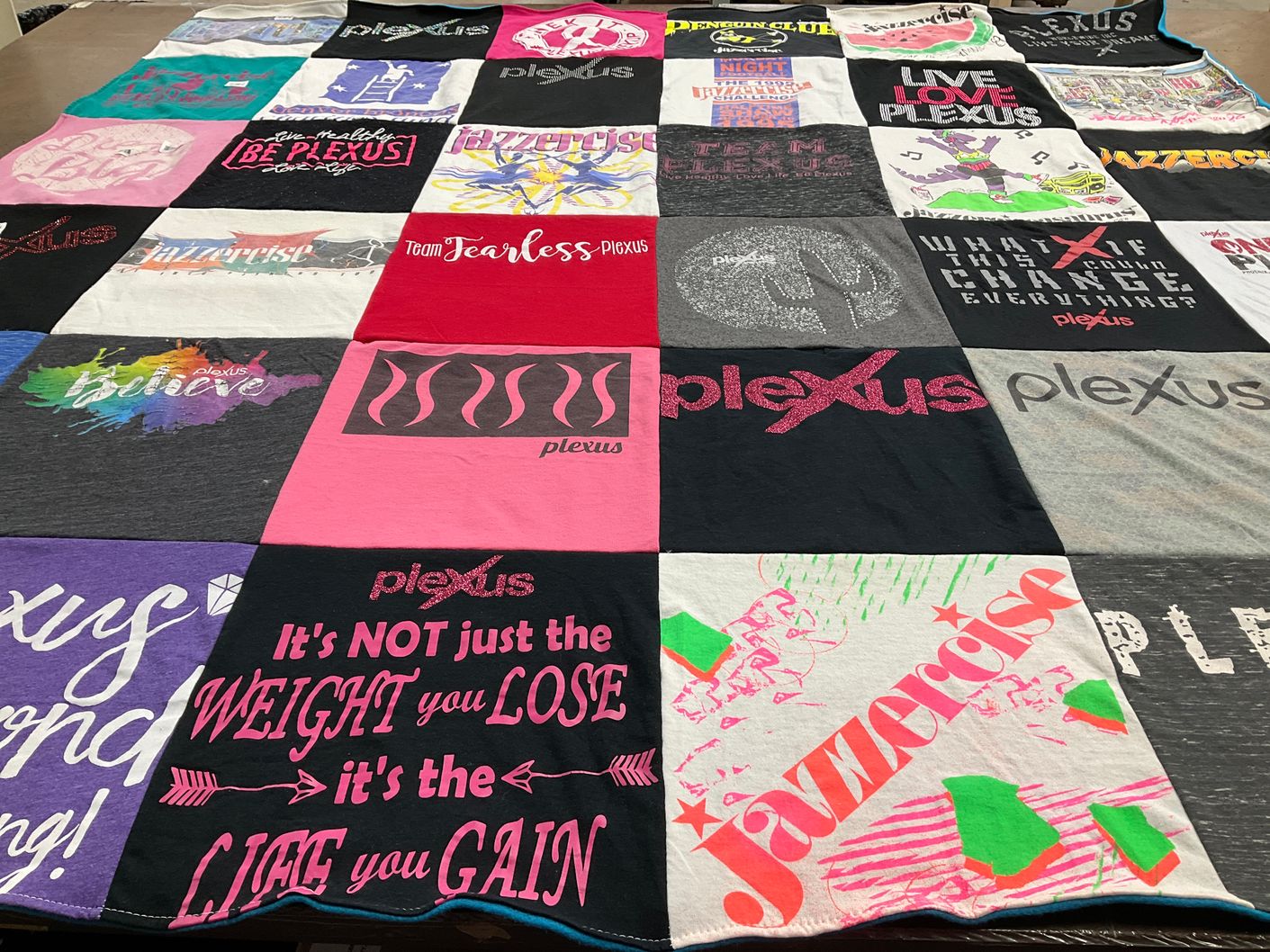 T-shirt quilt with fitness, health themes by Bev from CO