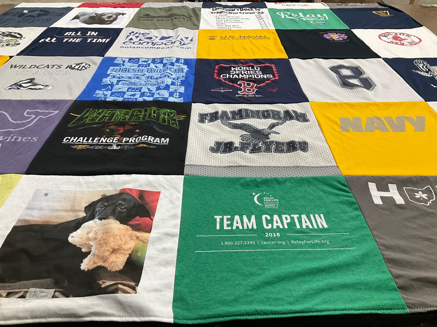 T-shirt quilt featuring navy, framingham jr flyers by Laura from MA