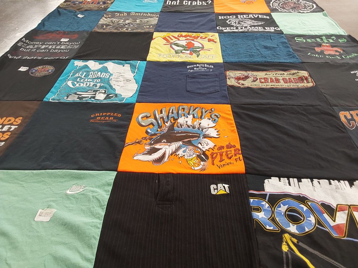 T-shirt quilt with fishing, seafood themes by Catherine from FL