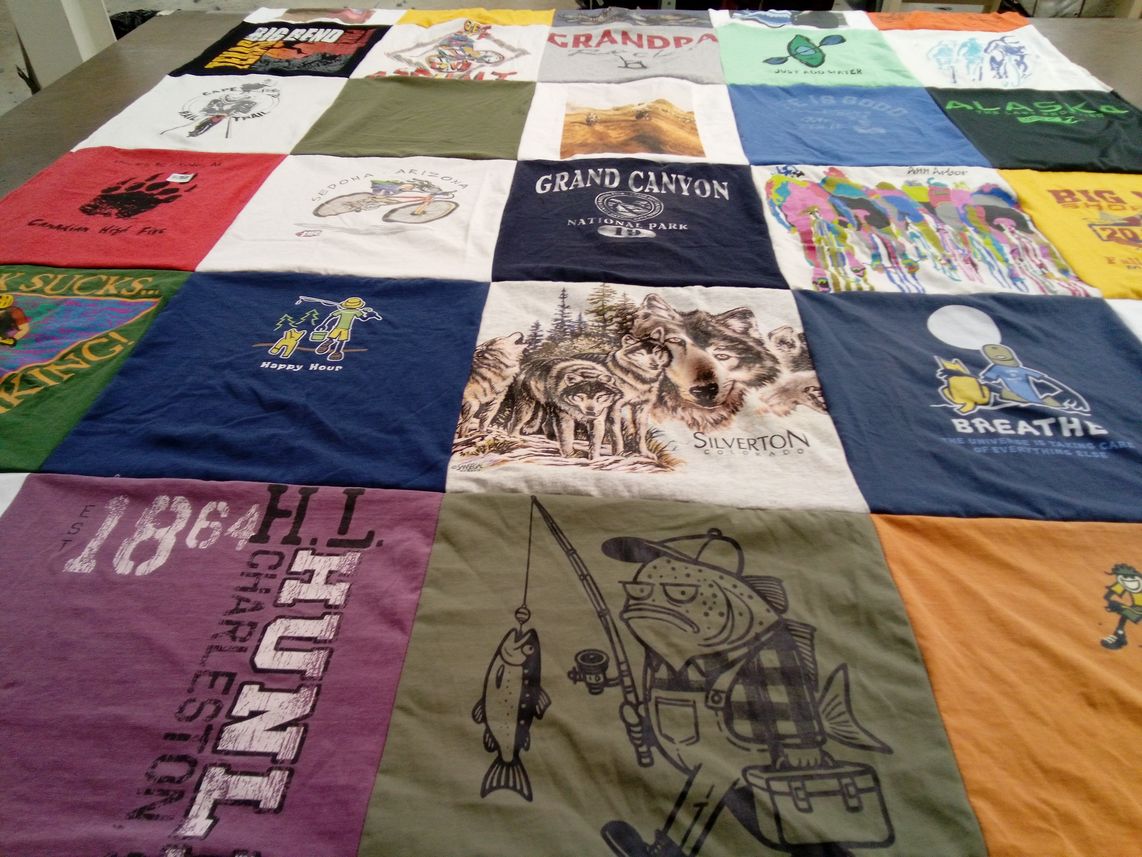 T-shirt quilt with hiking, fishing themes by Sarah from MI