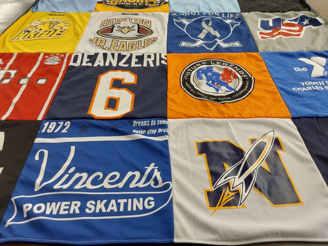 T-shirt quilt with hockey, sports themes by Christopher from MA
