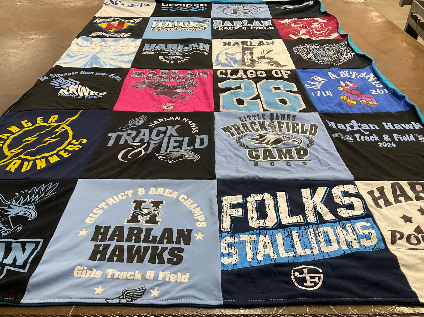 T-shirt quilt featuring harlan hawks track and field, harlan girls track and field by Kristy from TX