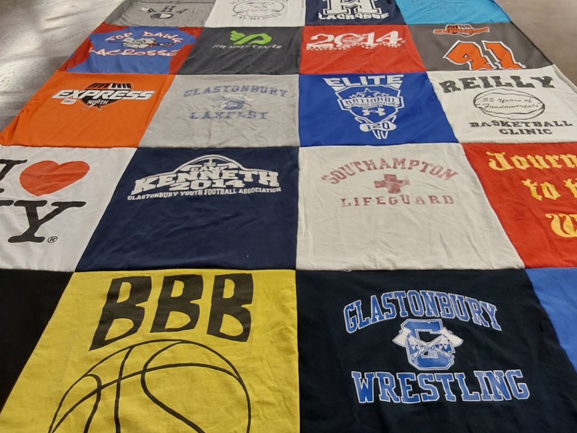 T-shirt quilt featuring glastonbury wrestling by fiona from AZ