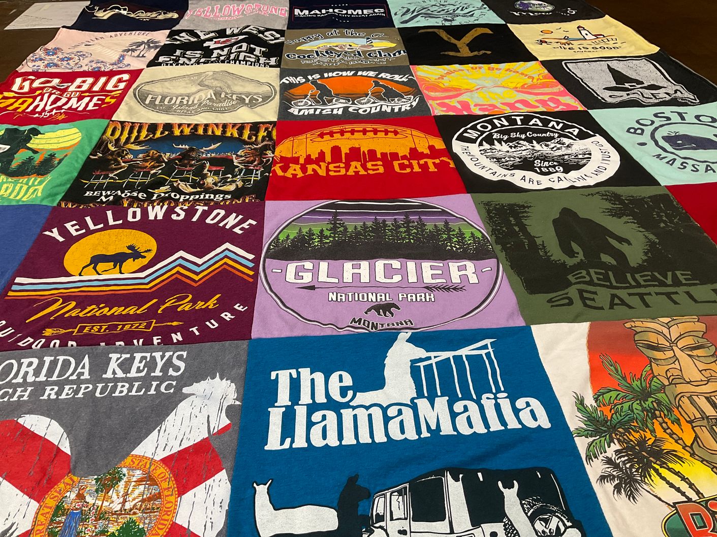 T-shirt quilt with outdoor adventure, travel themes by Jo from NC