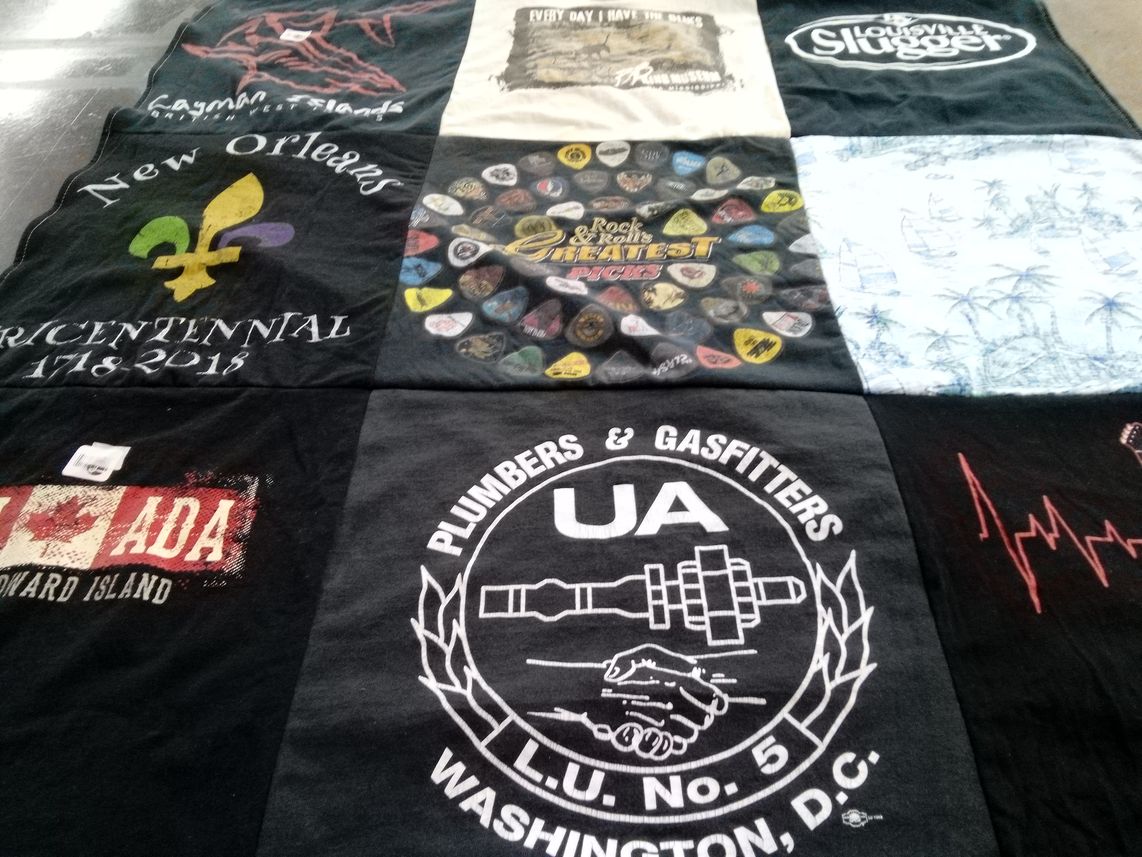 T-shirt quilt with music, sports themes by Mary from MD