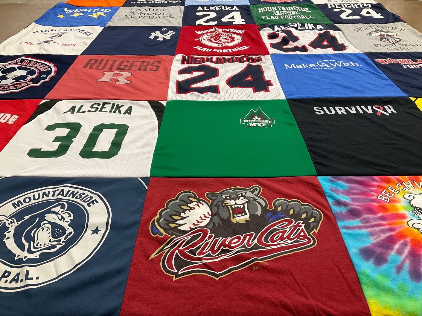 T-shirt quilt featuring river cats by Prudence from NJ