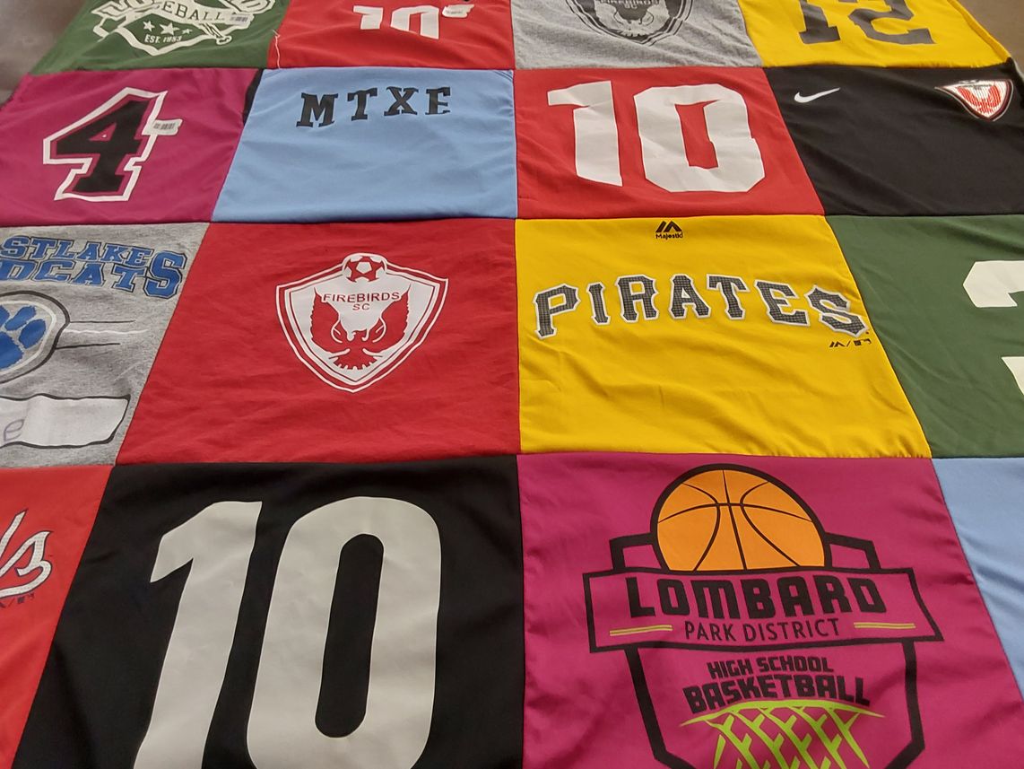 T-shirt quilt featuring firebirds sc, cats by Maria from IL