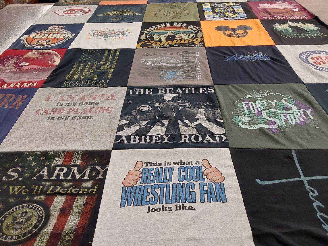T-shirt quilt with camping, wrestling themes by Beverly from AL