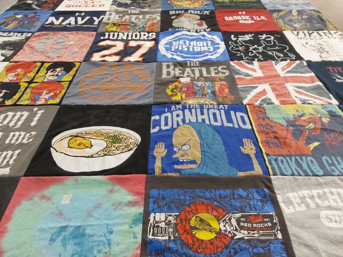 T-shirt quilt with music, sports themes by Bernhard from MI
