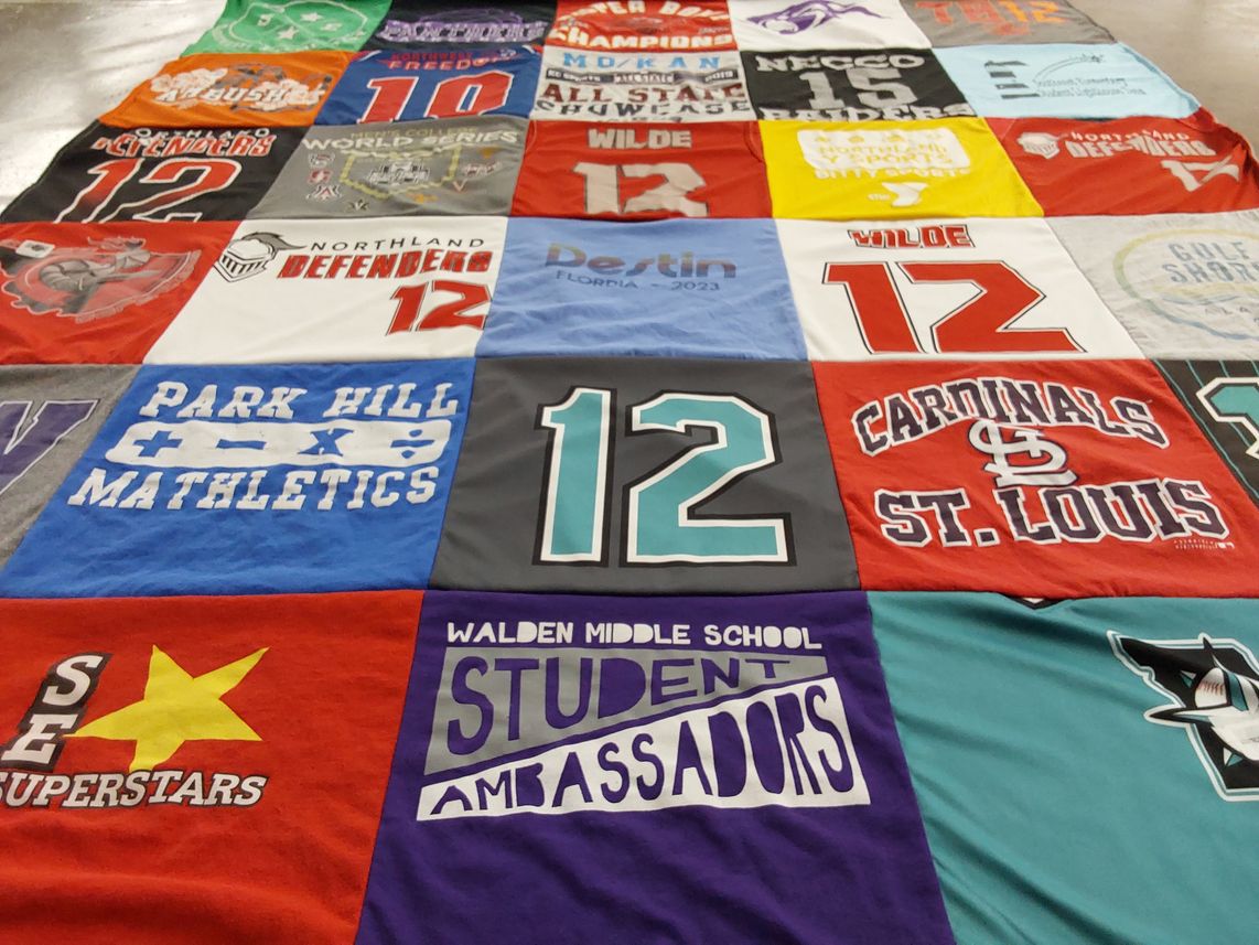 T-shirt quilt featuring cardinals of st. louis, northland defenders by Jeannie from MO