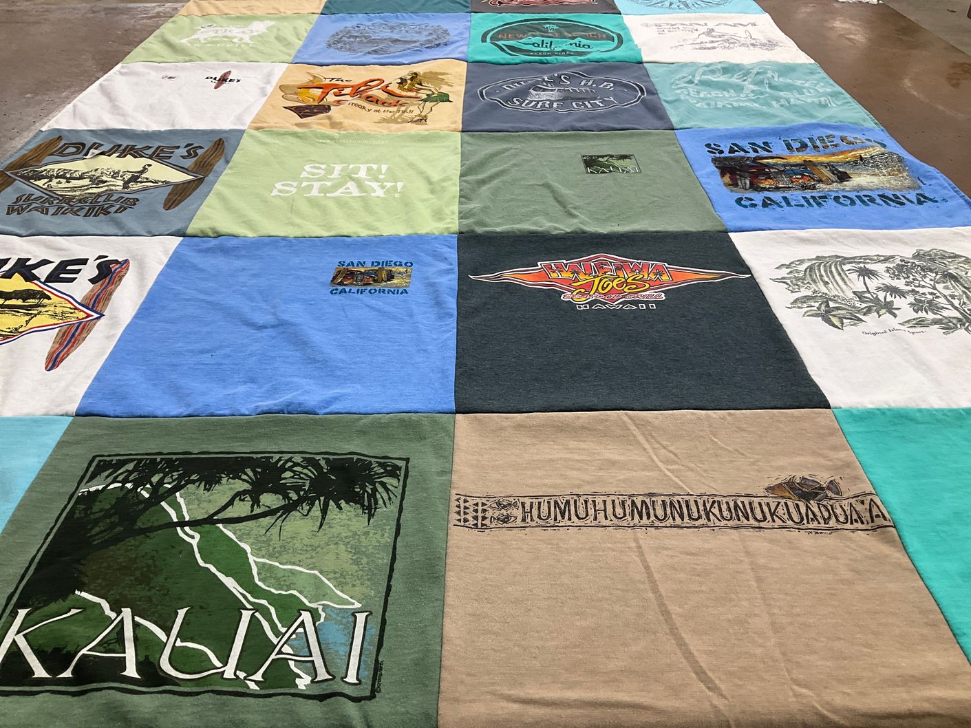 T-shirt quilt with travel, beaches themes by Victoria from CA