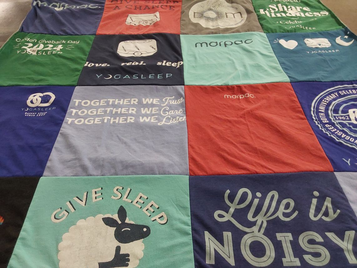 T-shirt quilt with sleep, yoga themes by Angel from NC