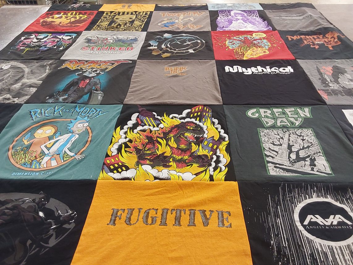 T-shirt quilt with tv shows, music themes by Leslie from CO