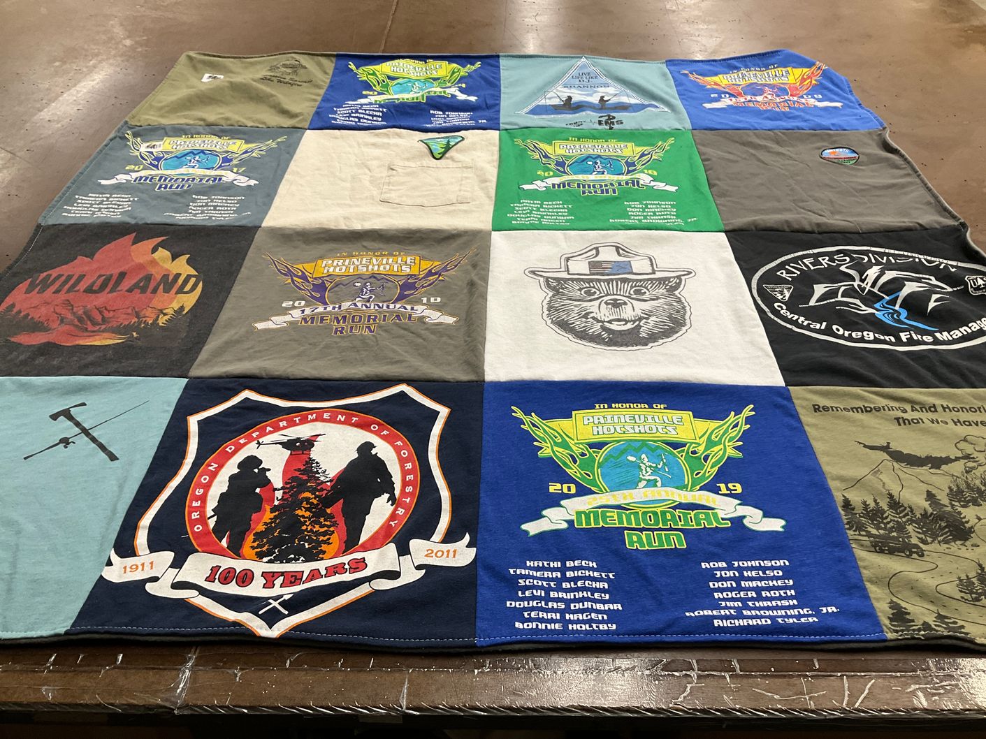 T-shirt quilt with fire safety, community events themes by Amber from OR