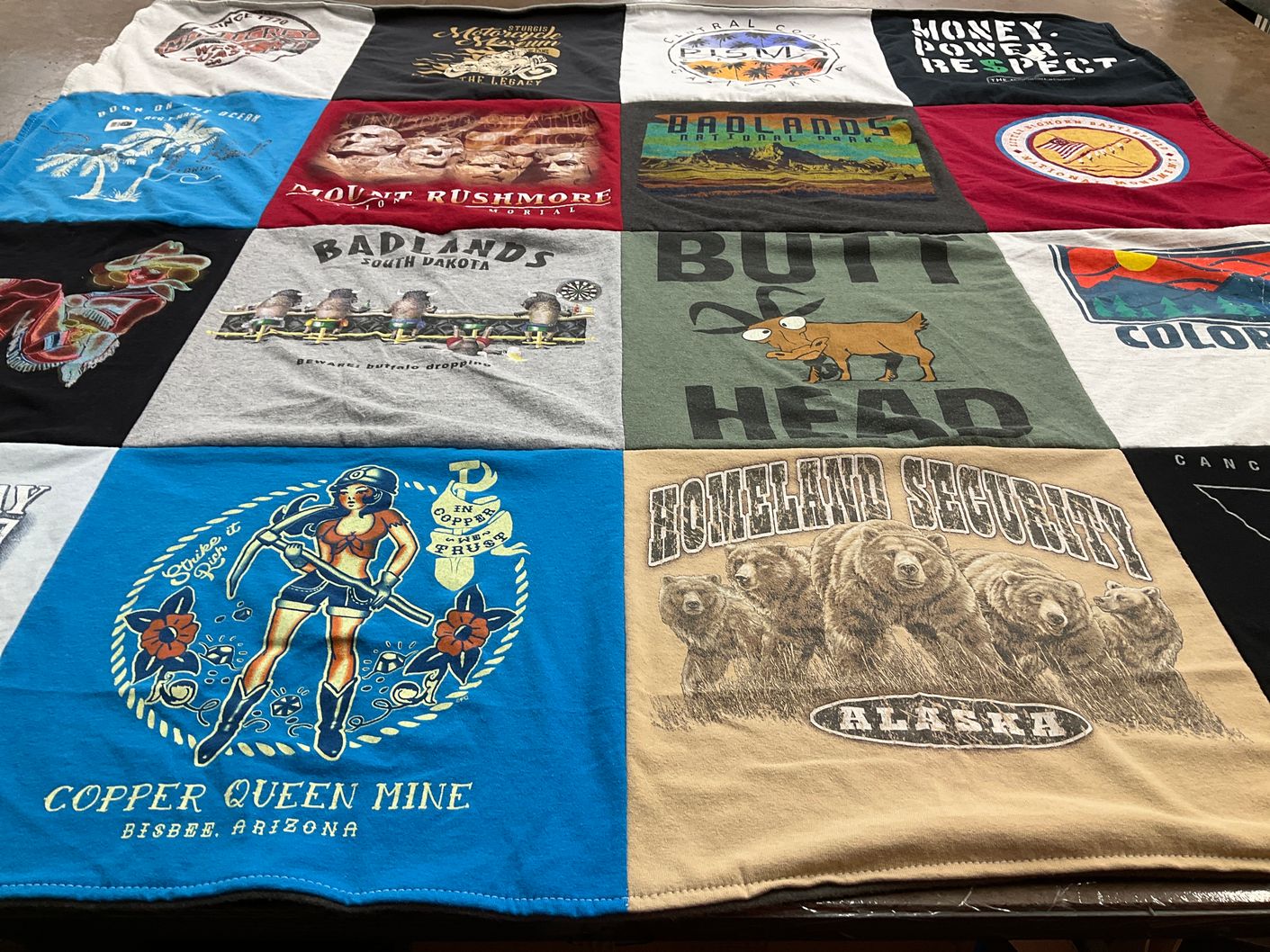 T-shirt quilt with travel, tourism themes by Amy from IN