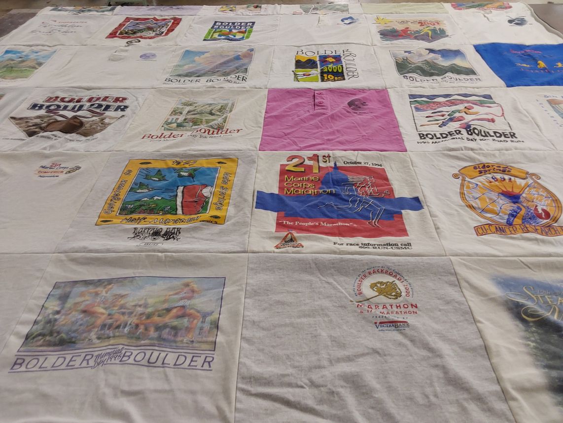 T-shirt quilt with running, sporting events themes by Joe from CO
