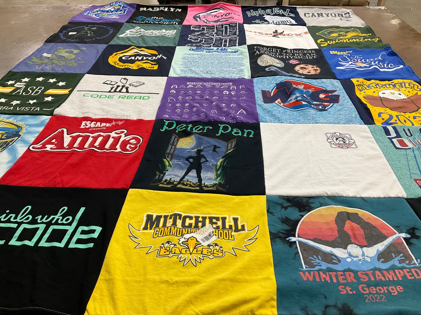 T-shirt quilt from mitchell community school by Amanda from CA