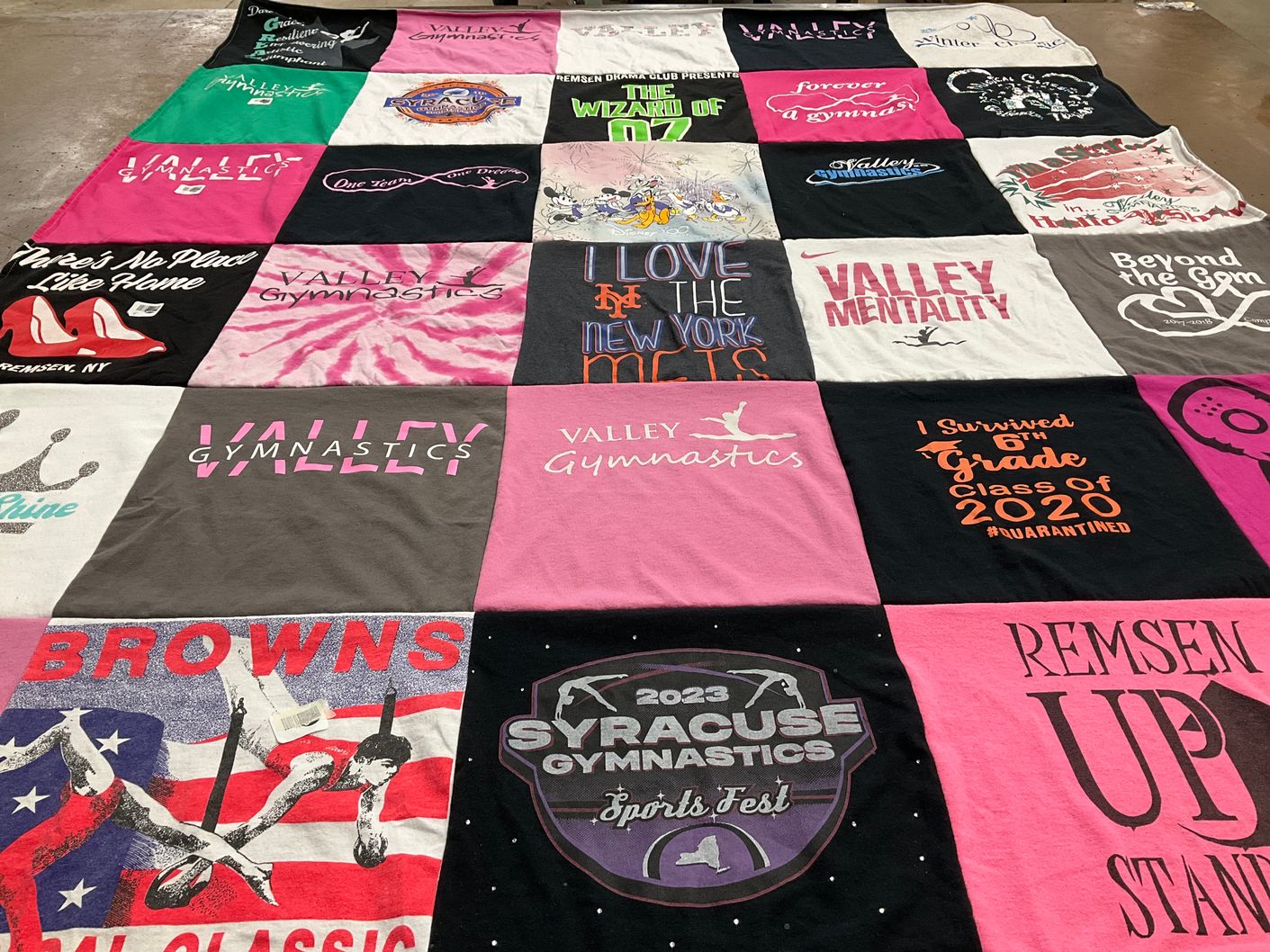 T-shirt quilt with gymnastics, sports themes by Fay from NY