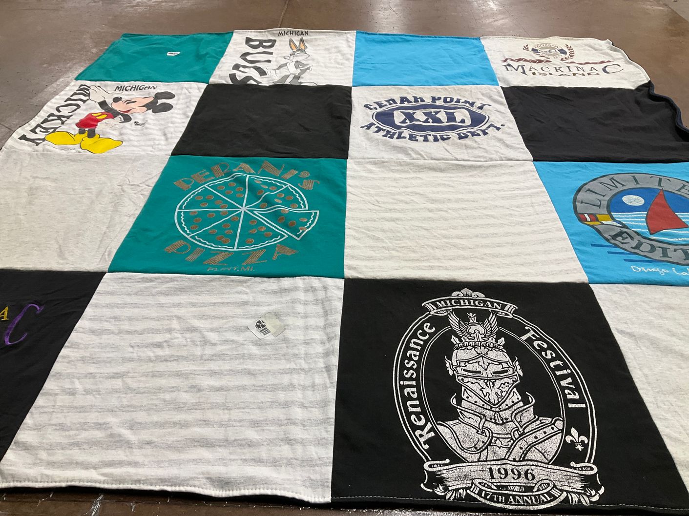 T-shirt quilt with pizza, amusement parks themes by Debbie from MI