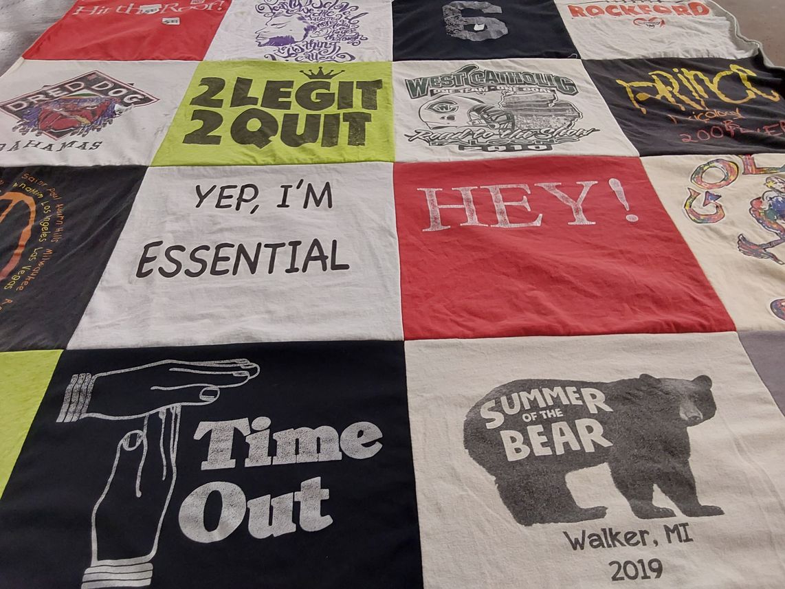 T-shirt quilt from west catholic high school by Penny from MI