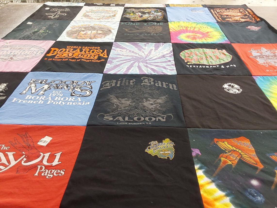 T-shirt quilt with travel, dining themes by Katherine from LA