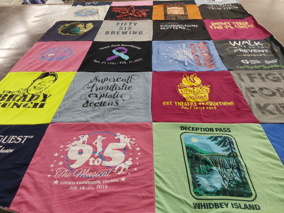 T-shirt quilt with theatre, musicals themes by Tara from IA
