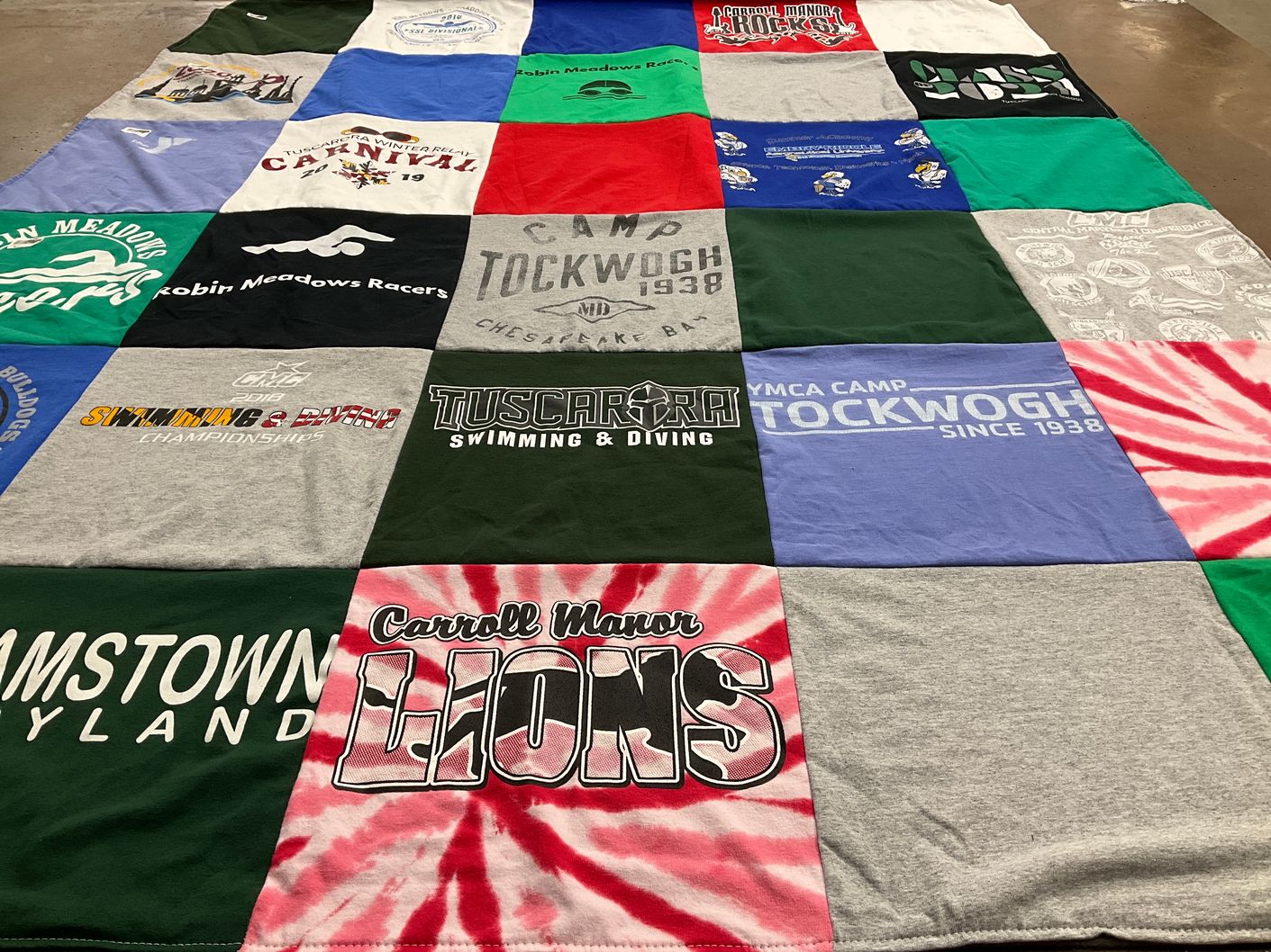 T-shirt quilt featuring robin meadows racers, carroll manor lions by Laurie from NC