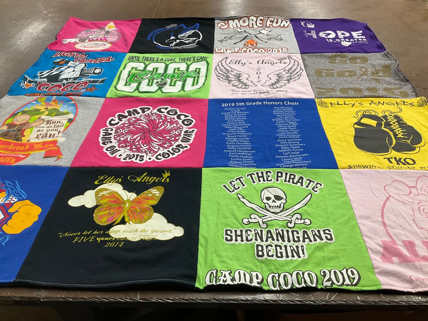 T-shirt quilt with camping, singing themes by Amber from MT