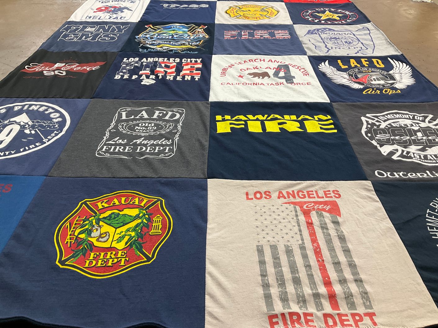 T-shirt quilt with firefighting, community service themes by Dominic from CA