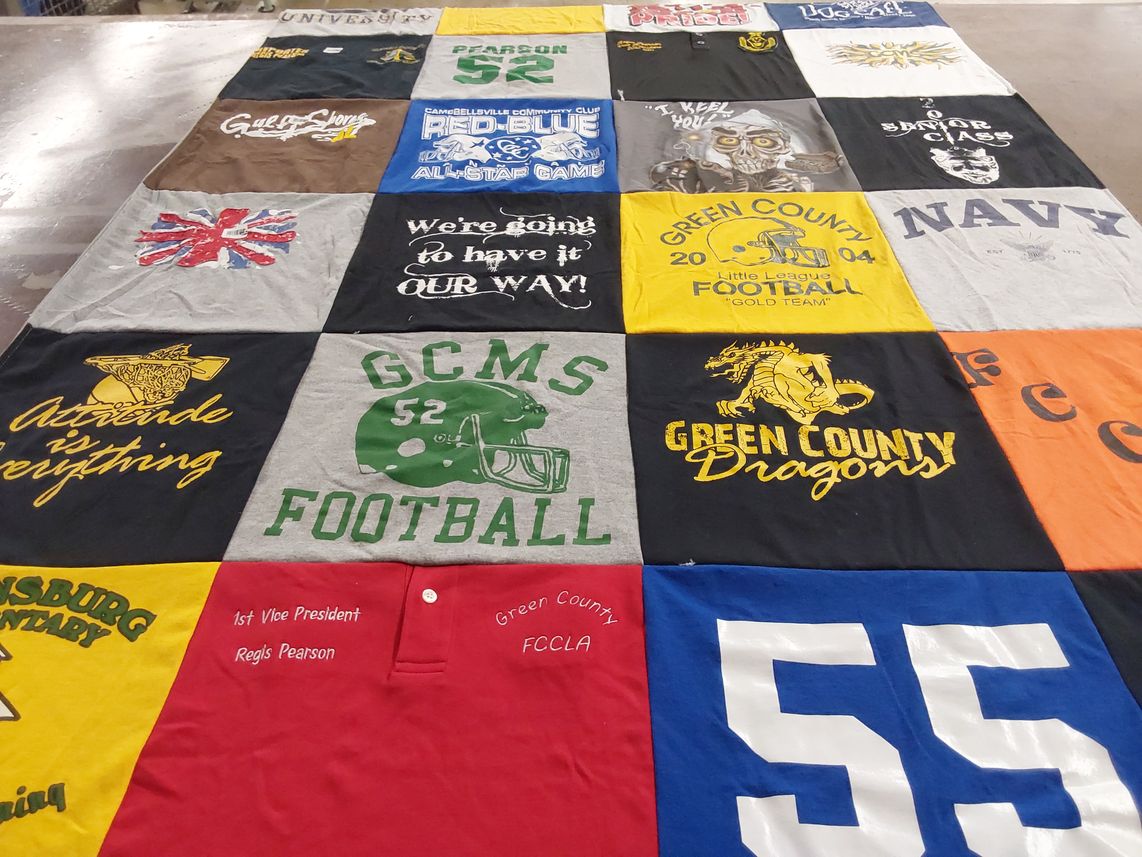T-shirt quilt featuring green county dragons by Teresa from KY