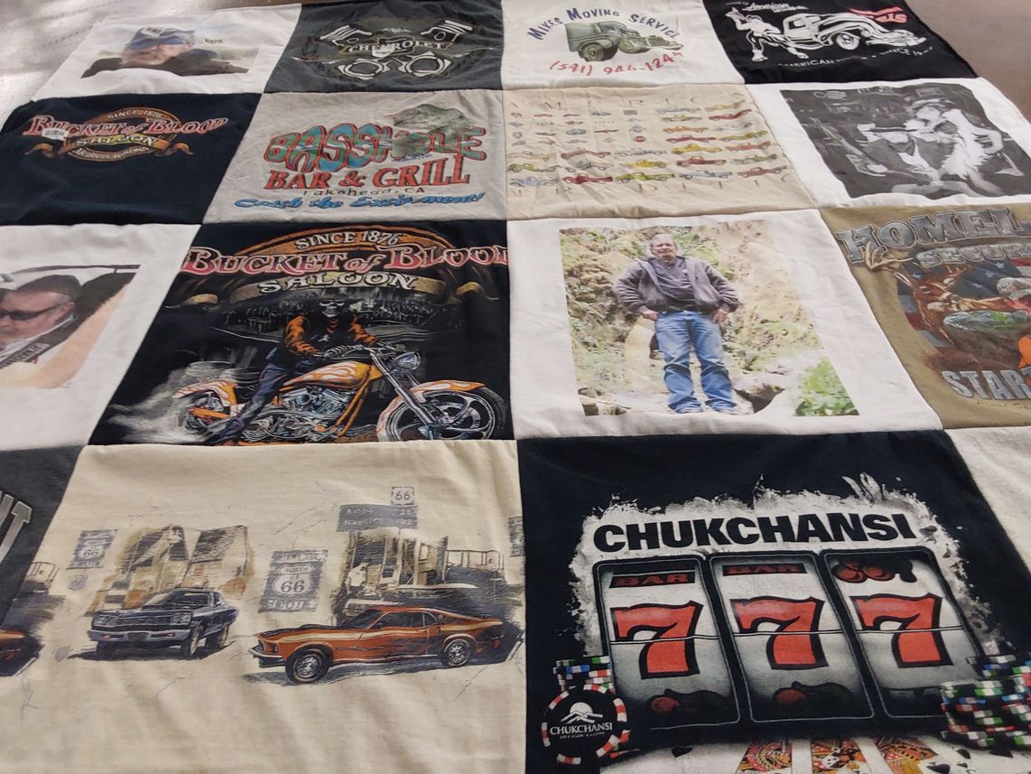 T-shirt quilt with motorcycles, gaming themes by Laura from OR