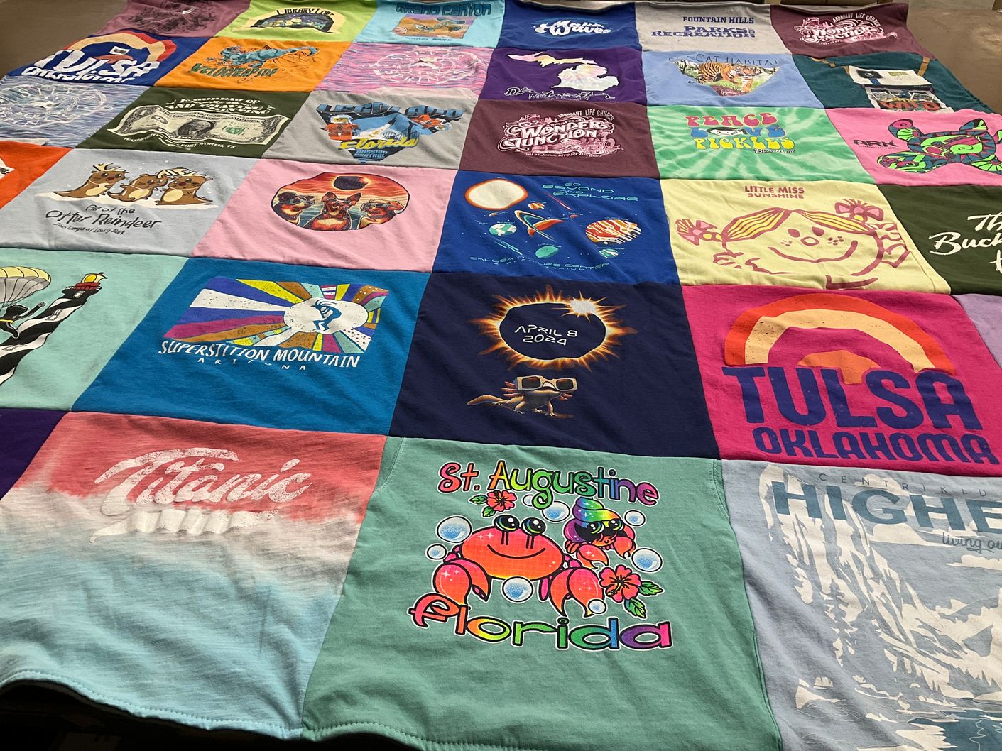 T-shirt quilt with travel, nature themes by Cassia from FL