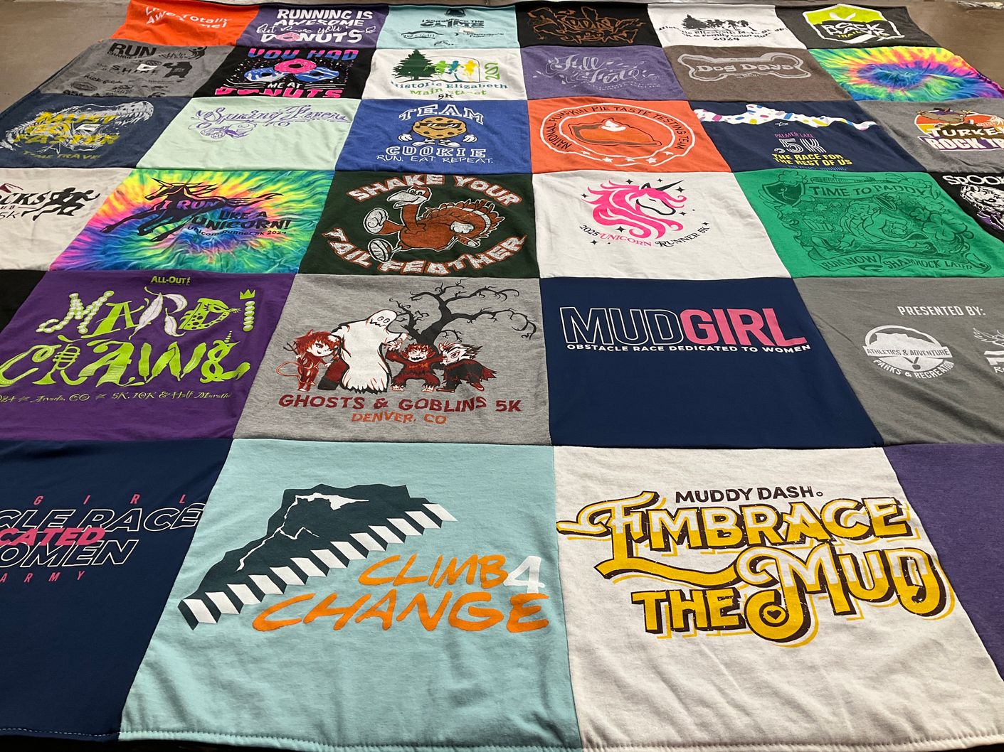 T-shirt quilt with running, obstacle racing themes by Stephanie from CO
