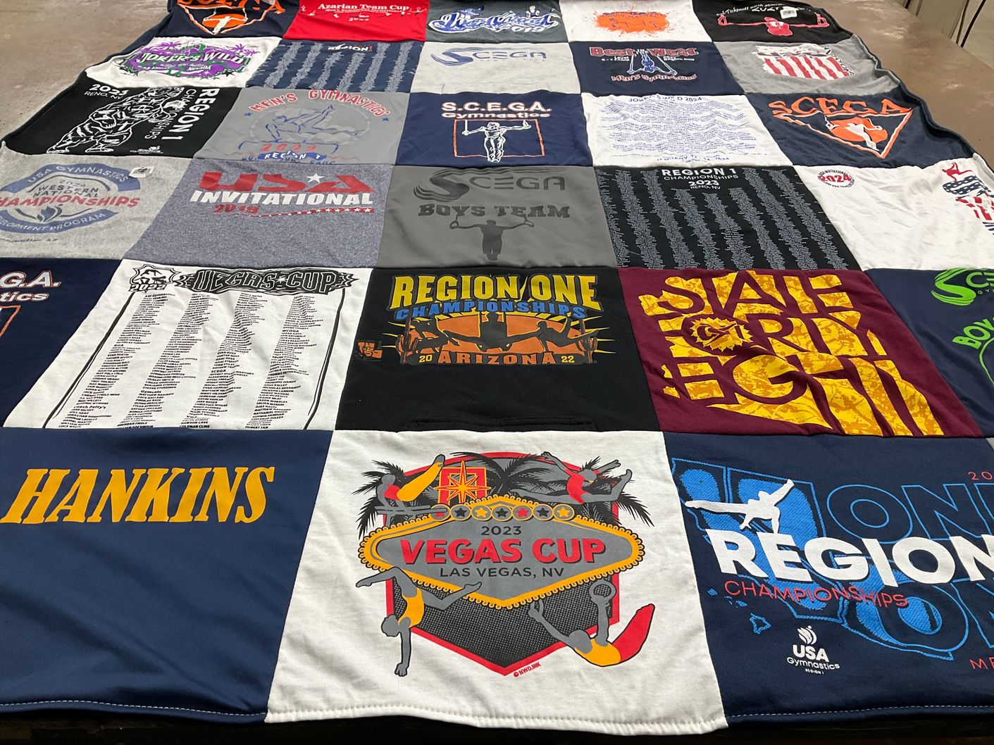 T-shirt quilt with gymnastics, sports themes by Danielle from CA