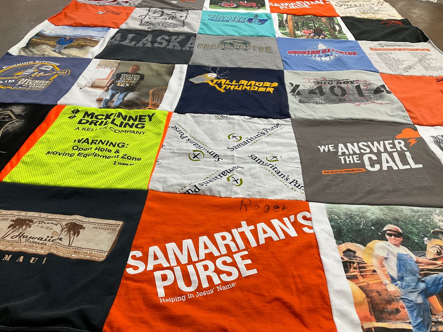 T-shirt quilt with charity, disaster relief themes by Beth from OH