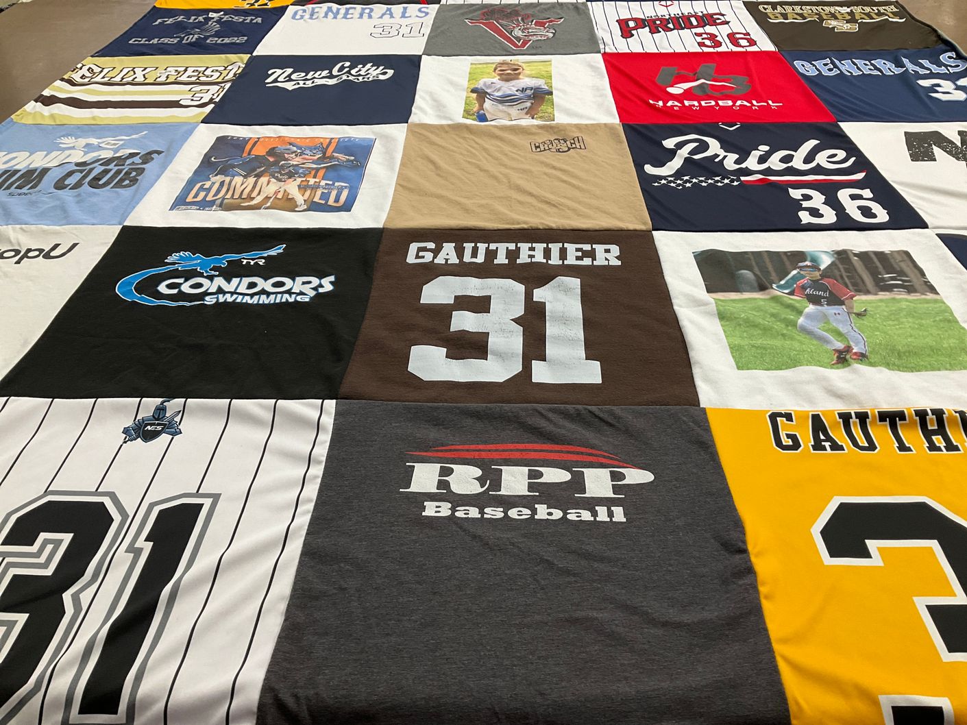 T-shirt quilt featuring condors swimming, pride by Nancy from NY