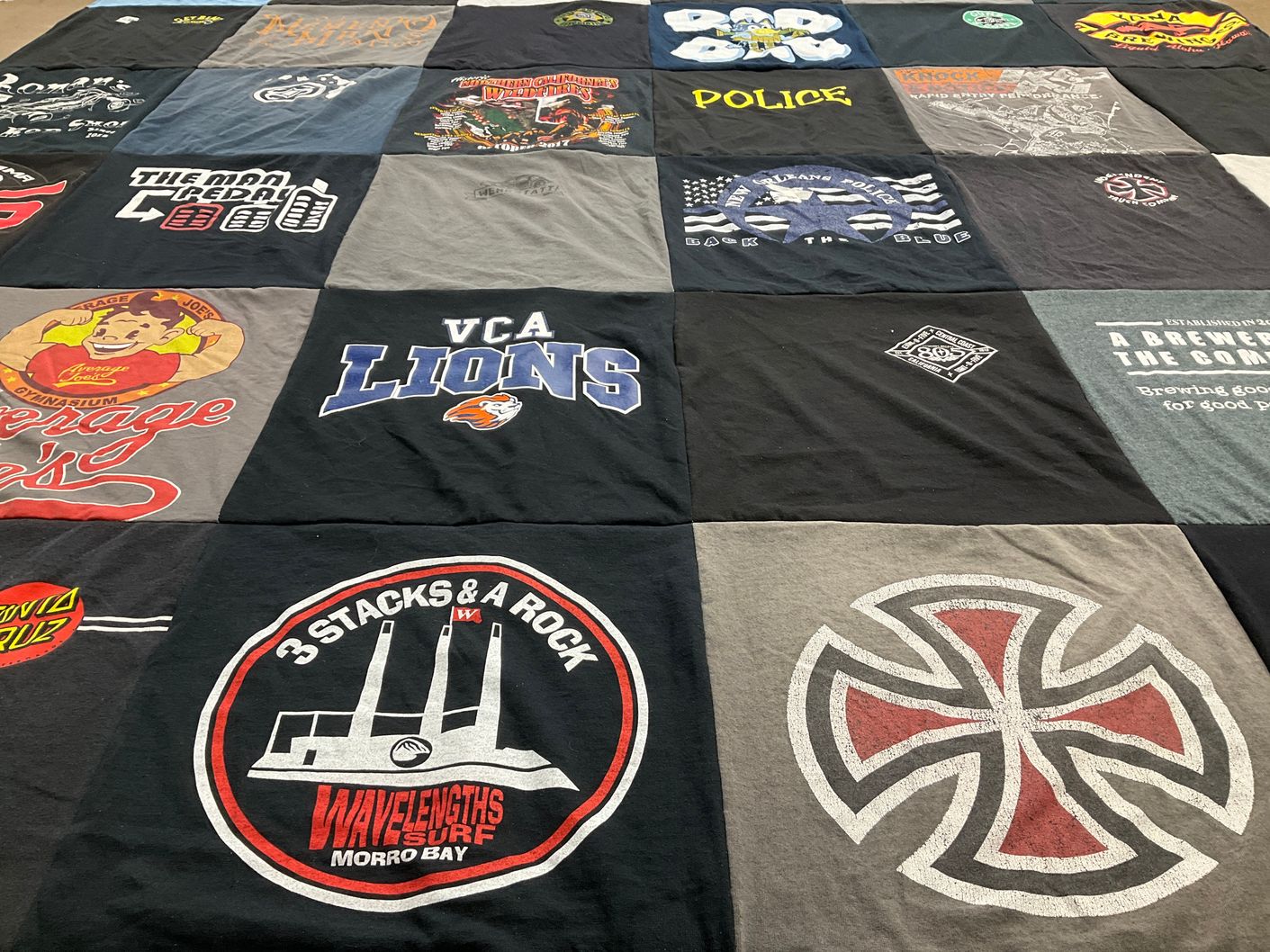 T-shirt quilt with surfing, gym themes by Tara from CA