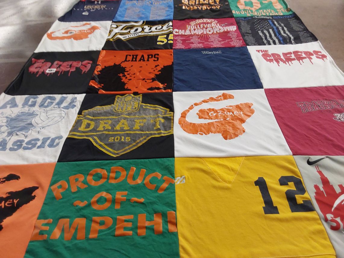 T-shirt quilt with sports, music themes by shani from IL
