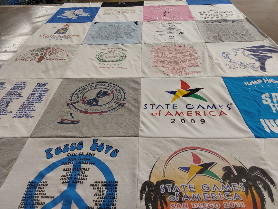 T-shirt quilt with sports, ice skating themes by Vicki from WY
