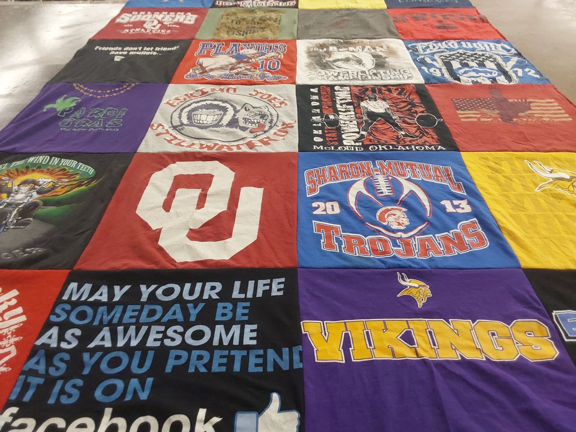 T-shirt quilt featuring sharon mutual trojans, vikings by Erin from OK