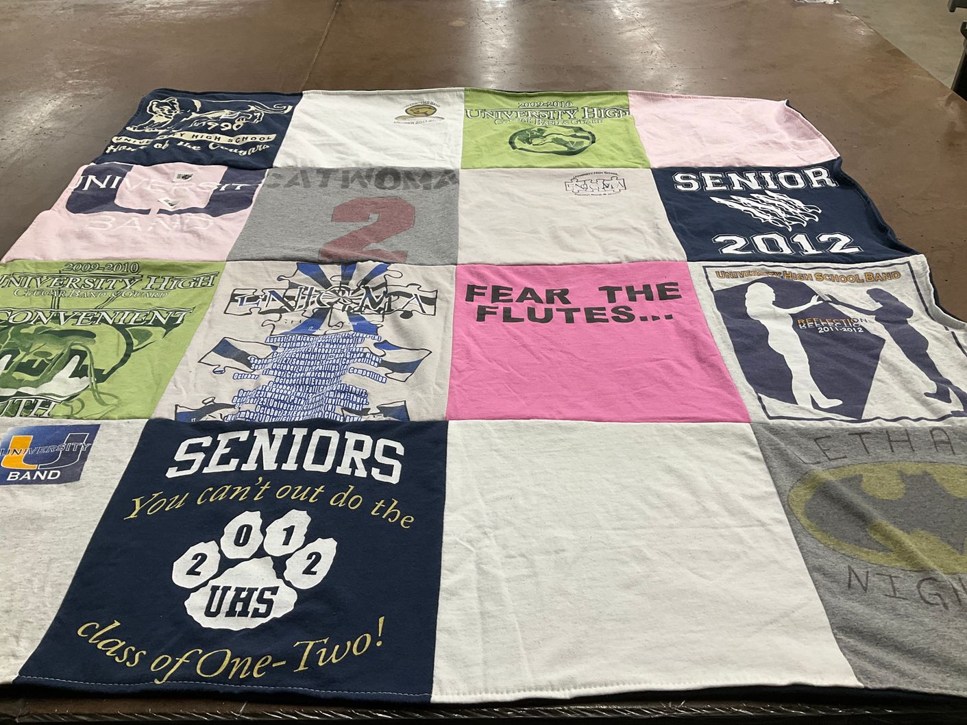 T-shirt quilt from university high school by Amal from FL