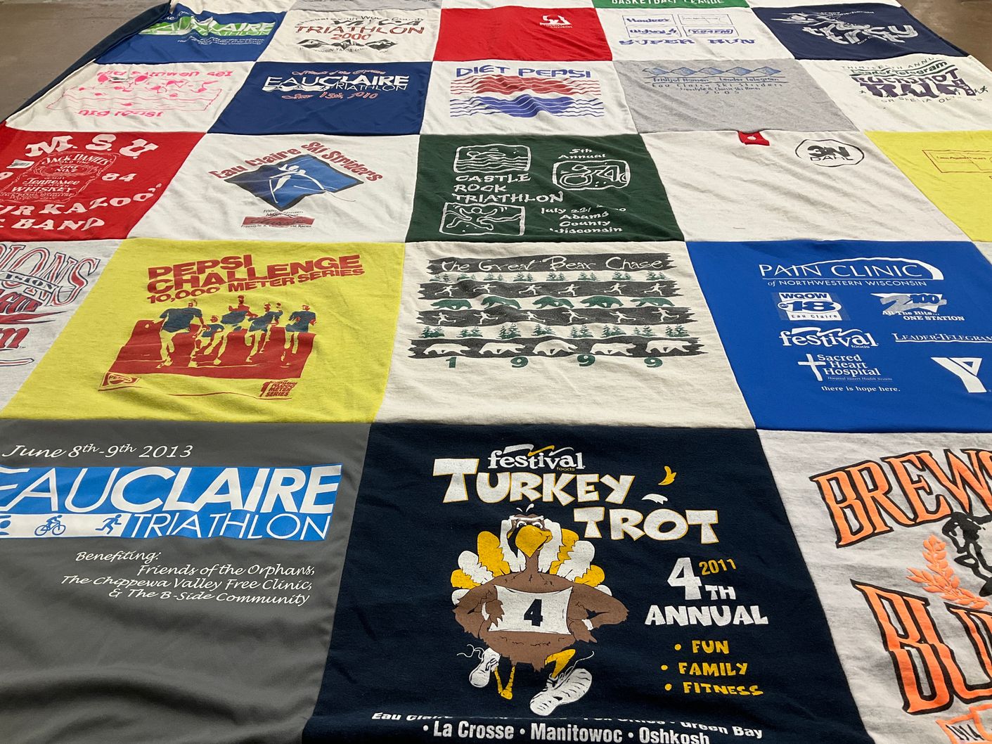 T-shirt quilt featuring eau claire ski sprinters by Teresa from WI