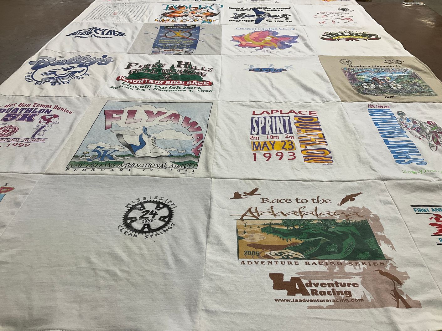T-shirt quilt with cycling, duathlons themes by Rosanne from LA