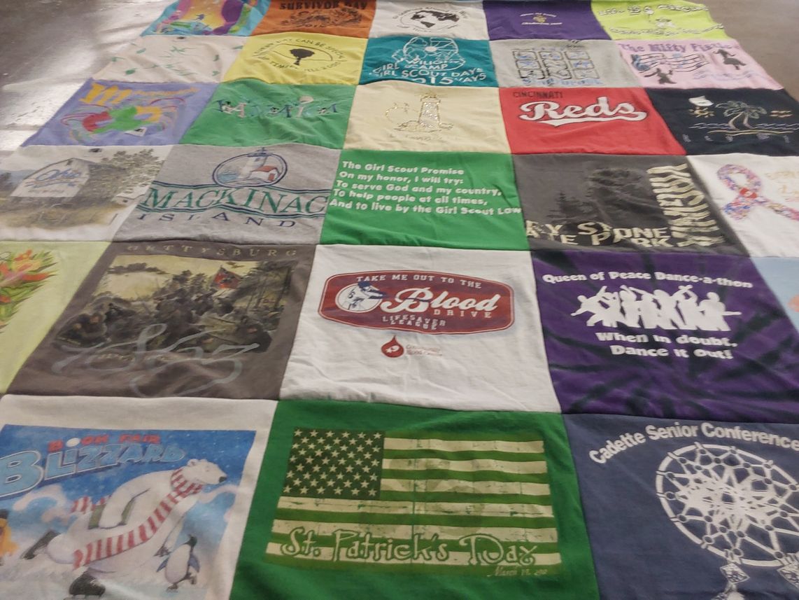 T-shirt quilt with girl scouts, sports themes by Laura from OH