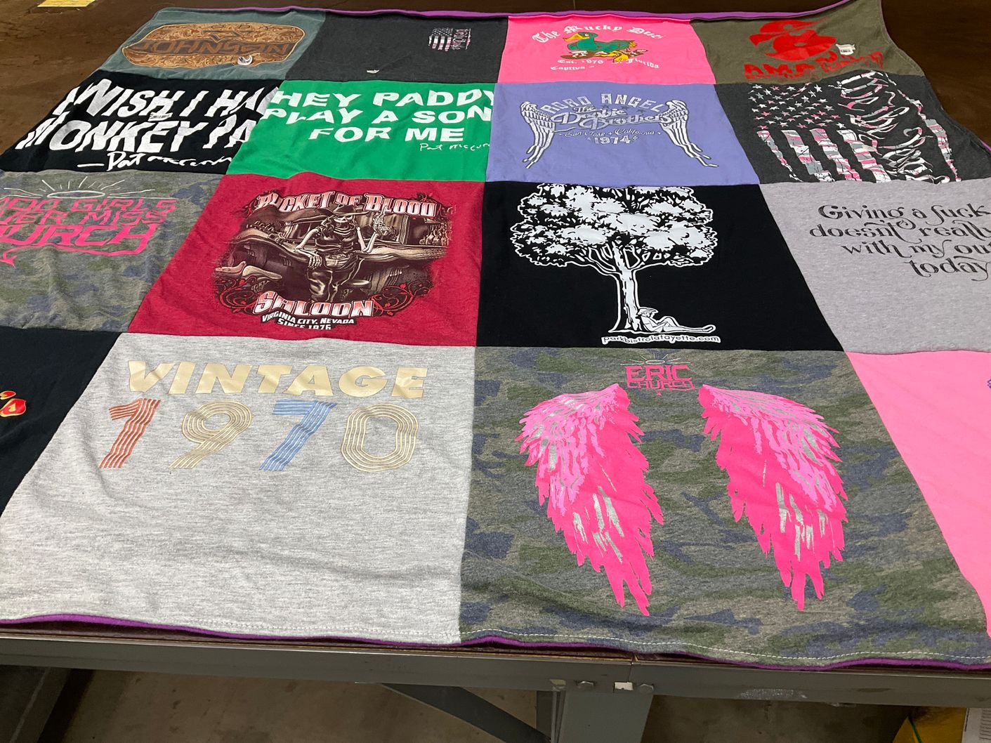 T-shirt quilt with music, motorcycles themes by Lisa from CA
