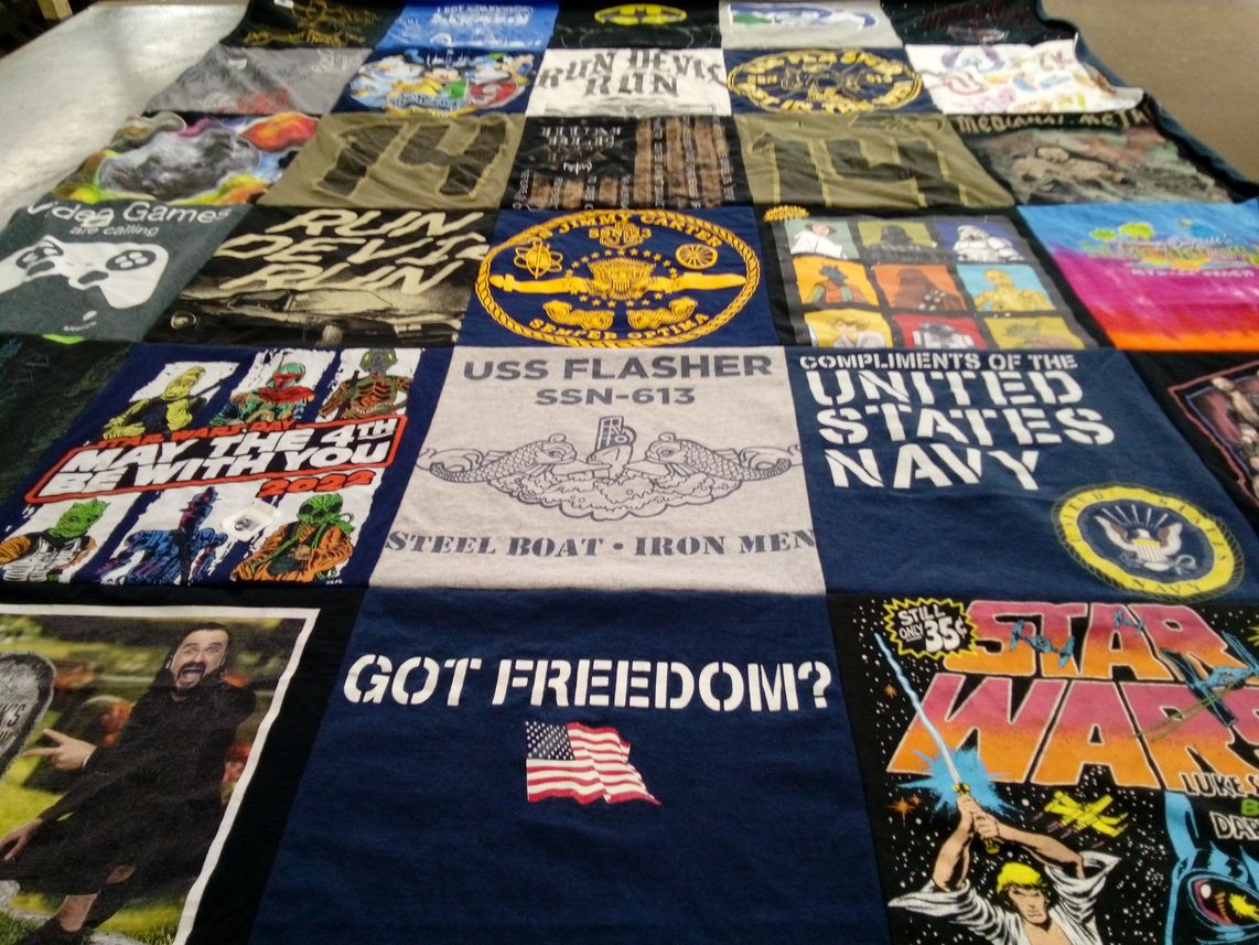 T-shirt quilt with star wars, video games themes by Denise from SC