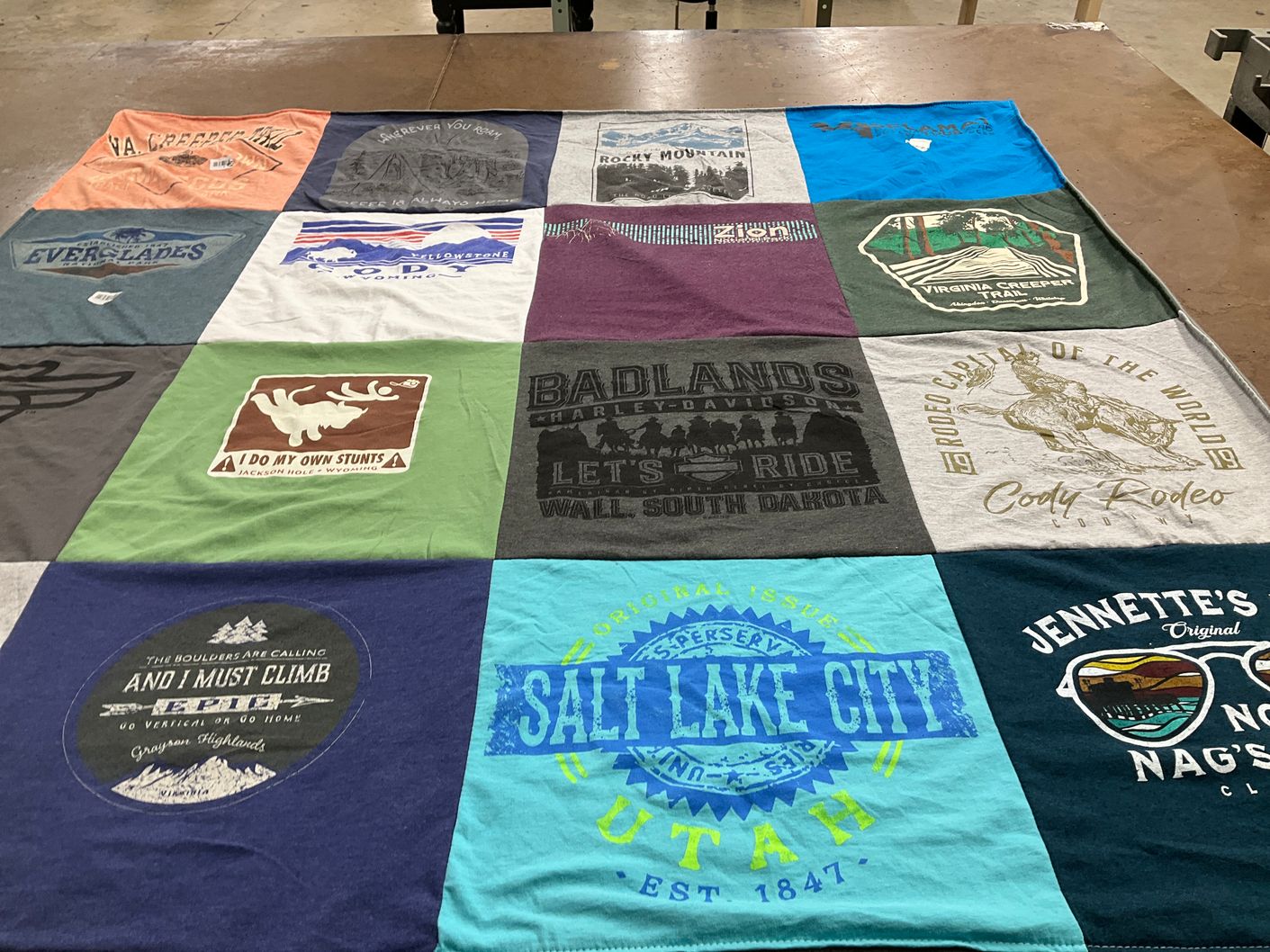 T-shirt quilt with hiking, outdoor activities themes by Carla from NC