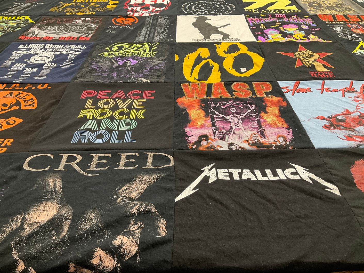 T-shirt quilt with music, rock themes by carla from IL