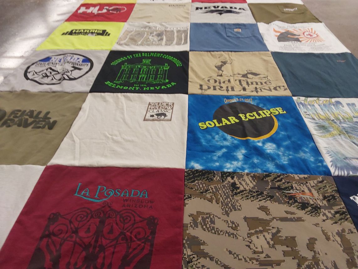 T-shirt quilt with travel, eclipse themes by Kelly from OR